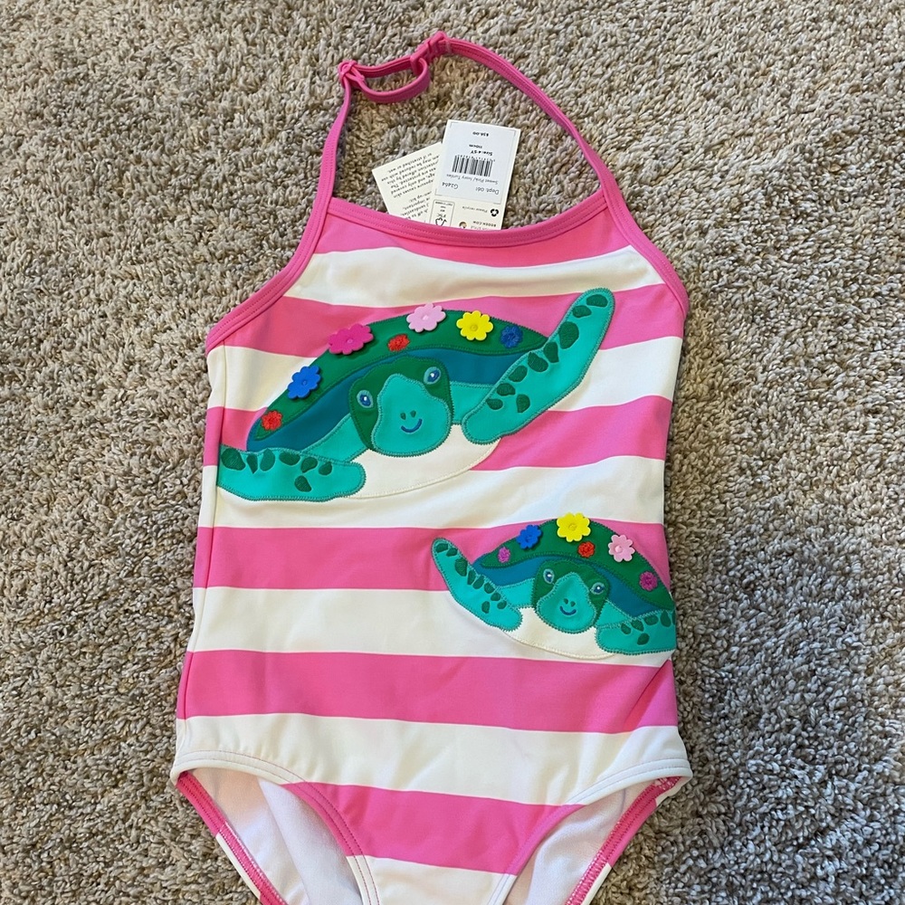 Beautiful, unworn girl’s swimsuit. NWT.